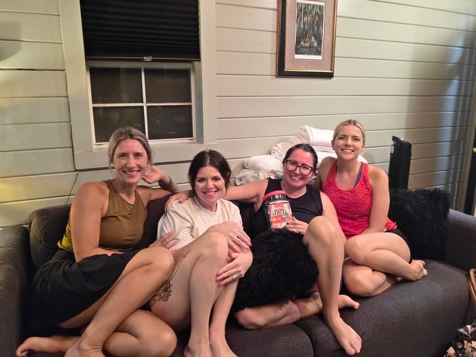 A group of friends on the sofa during a girls' trip